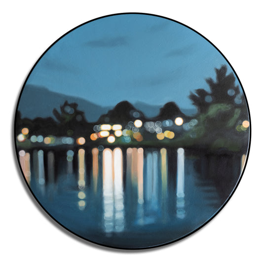 Blue painting of Lake Te Anau by New Zealand artist Mel McKenzie in a blurry bokeh style. Round oil painting on canvas shows lakeside lights reflected on water.