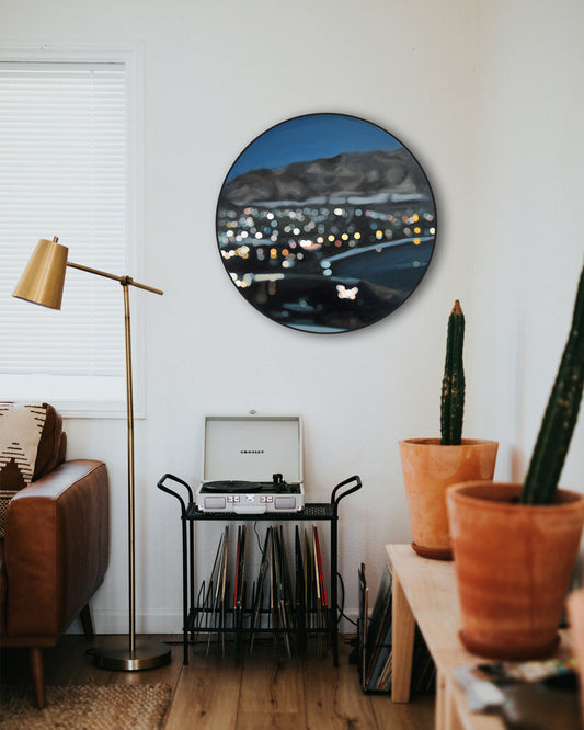 Living room art on a round canvas, 
Wanaka New Zealand oil painting in a blurry bokeh style by bokeh artist Mel McKenzie, The Penny Drops