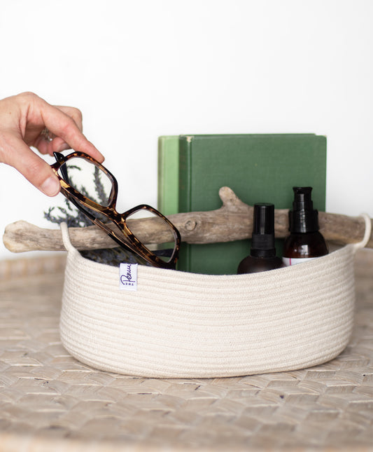 Large coiled rope basket with driftwood handle