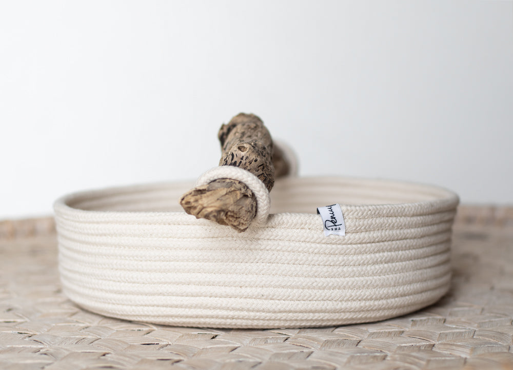 Oval basket with chunky rope and driftwood handle