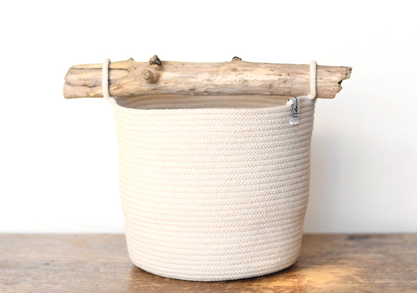 Tall rope basket with driftwood handle